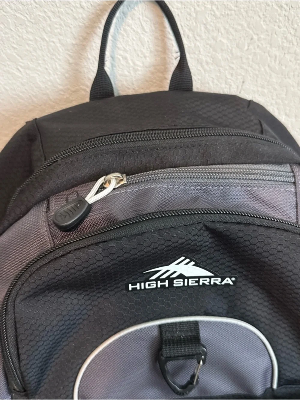 High Sierra Black and Gray Backpack with Blue and Orange Logo